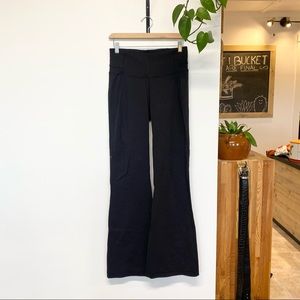 black lululemon flared yoga pants, good condition slight piling, size 8